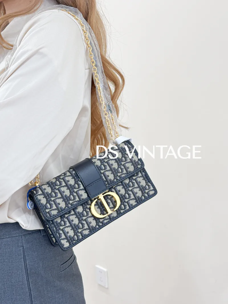 DIOR Crossbody Bag30 Montaigne East-West 30Blue Canvas Small21 × 6 × 12 cm — on-model view 1 of 3
