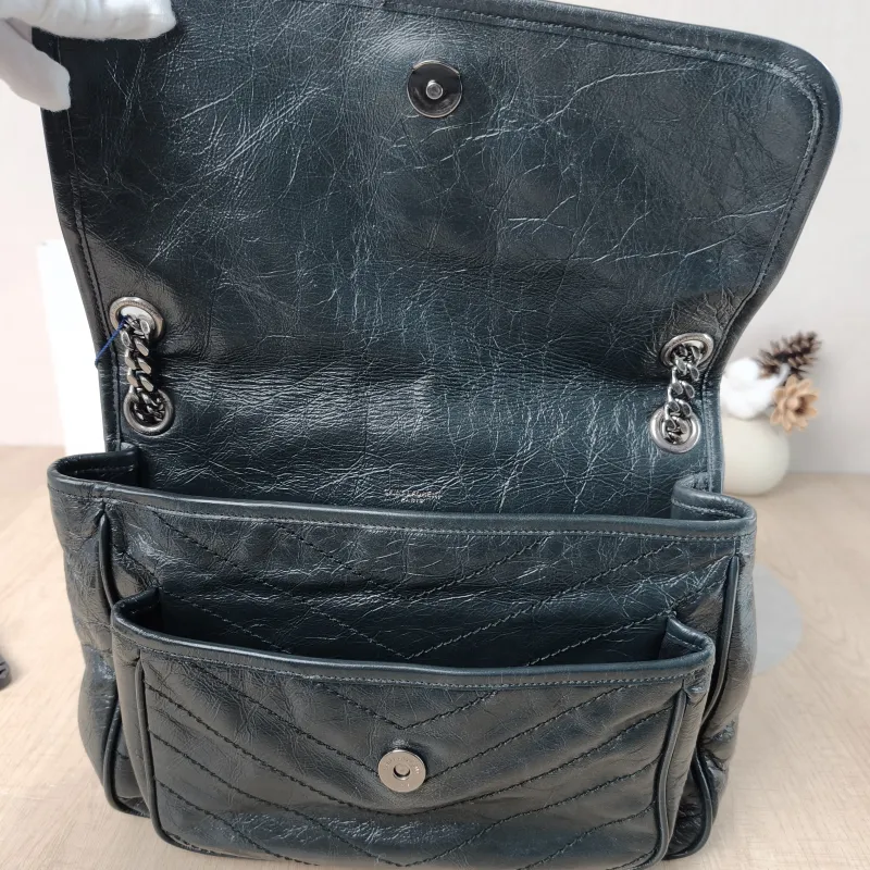 SAINT LAURENT Crossbody Bag Niki Green Waxed Leather Medium 28 × 8.5 × 20 cm — detail view 9 of 15