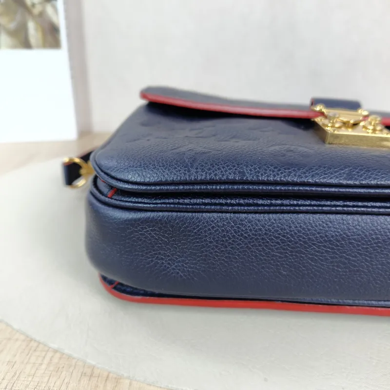 Louis Vuitton Crossbody Bag Pochette Métis · Monogram Empreinte Embossed Calfskin Medium 25 × 7 × 19 cm — detail view 1 of 13