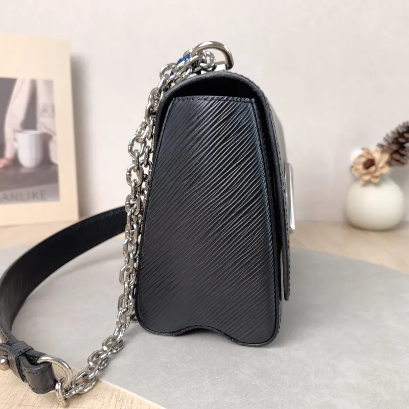 Louis Vuitton Crossbody Bag Twist Black Epi Embossed Calfskin Medium 23 × 9.5 × 17 cm — detail view 9 of 12