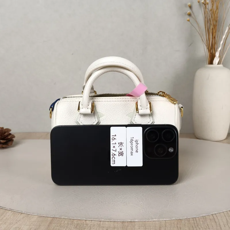Louis Vuitton Crossbody Bag Speedy Nano White · Green Monogram Empreinte Embossed Calfskin nano 16 × 7.5 × 10 cm — cover view 5 of 5