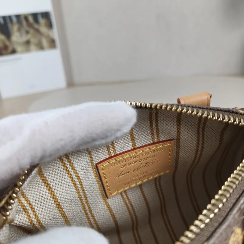 Louis Vuitton Crossbody Bag Speedy Nano PVC nano 16 × 7.5 × 10 cm — detail view 9 of 12