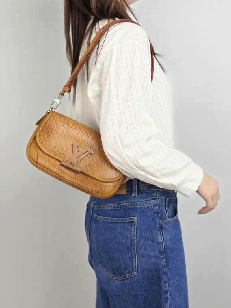 Louis Vuitton Shoulder Bag BUCI Epi Embossed Calfskin One Size 24.5 × 9 × 15.5 cm — on-model view 2 of 2