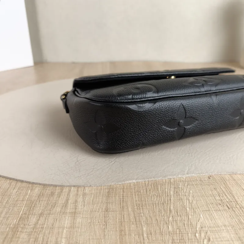 Louis Vuitton Crossbody Bag IVY Black Empreinte Embossed Calfskin Small 23.5 × 4.3 × 12 cm — detail view 1 of 12
