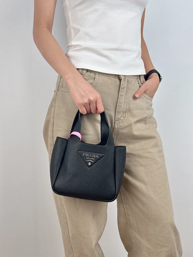 PRADA Shoulder Bag Black Calfskin Mini 18 × 9 × 16 cm — on-model view 2 of 2