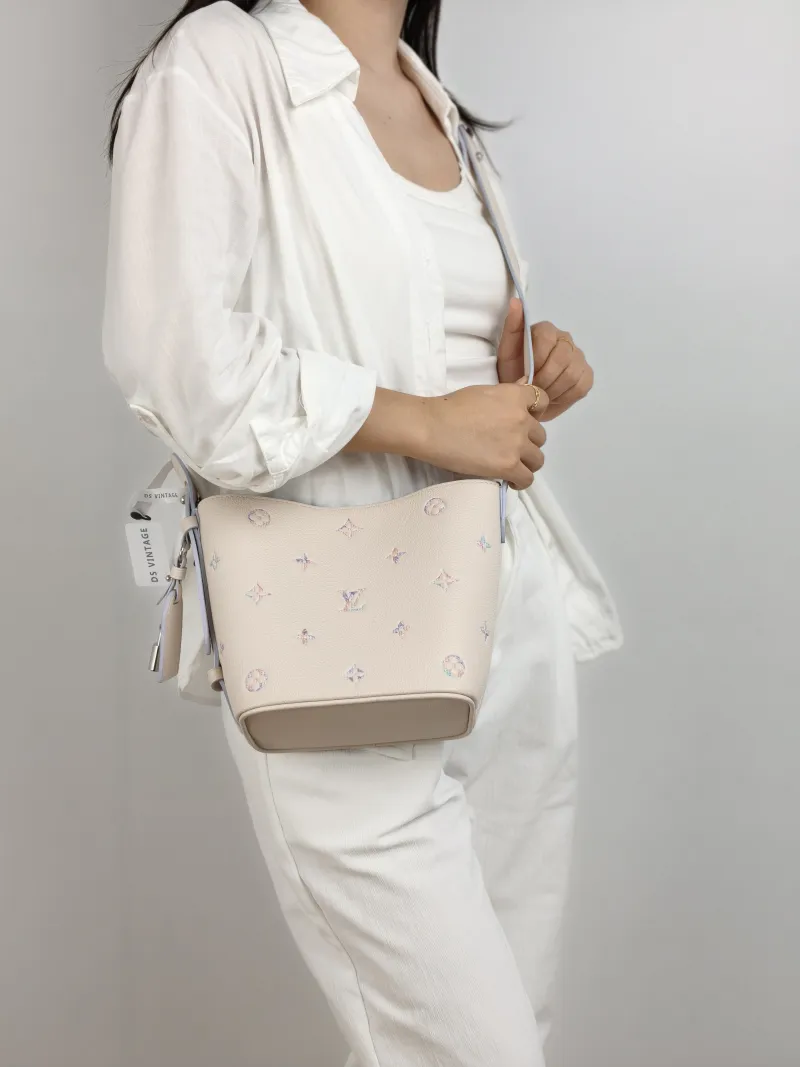 Louis Vuitton Top Handle Bag Collection White Calfskin BB 16 × 12 × 18 cm — on-model view 1 of 2