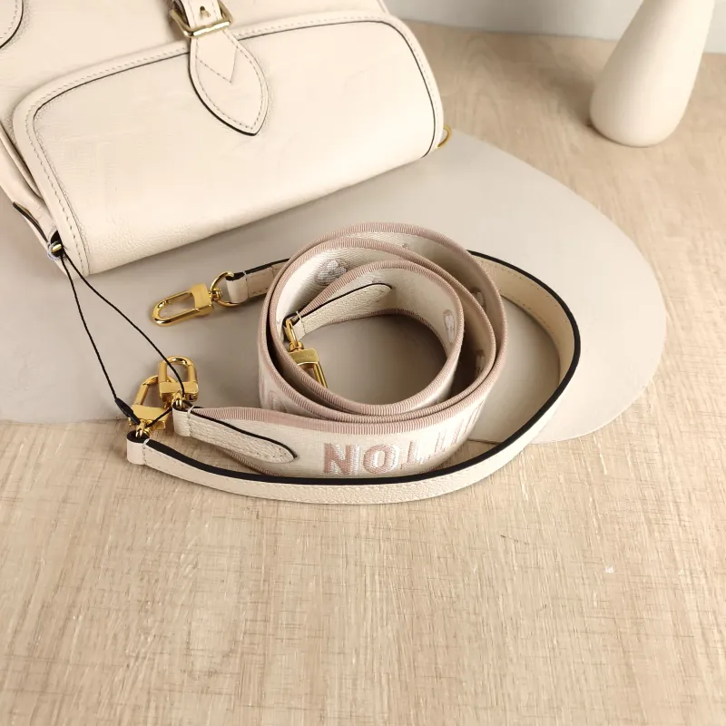 Louis Vuitton Crossbody Bag Diane Baguette Bag White Monogram Empreinte Embossed Calfskin Small 24 × 9 × 15 cm — detail view 5 of 12