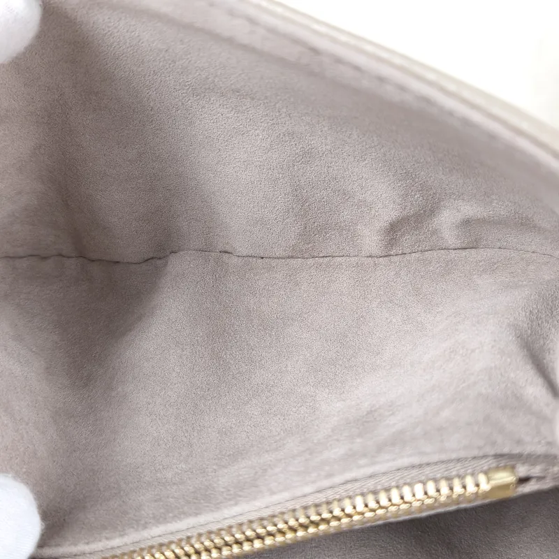 Louis Vuitton Crossbody Bag Pochette Métis East West Empreinte Embossed Calfskin Monogram Small21.5 × 6 × 13.5 cm — detail view 11 of 15