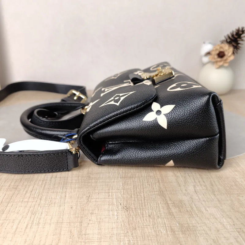 Louis Vuitton Crossbody Bag MADELEINE Black · White Monogram Empreinte Embossed Calfskin BB 24 × 8.5 × 17 cm — detail view 4 of 13