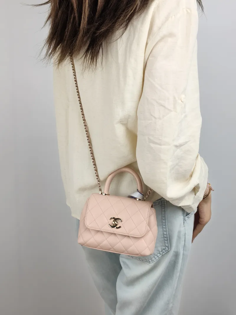Chanel Top Handle Bag Coco Handle​ Pink Grained Calfskin Mini 14.5 × 5.5 × 11.5 cm — on-model view 1 of 2