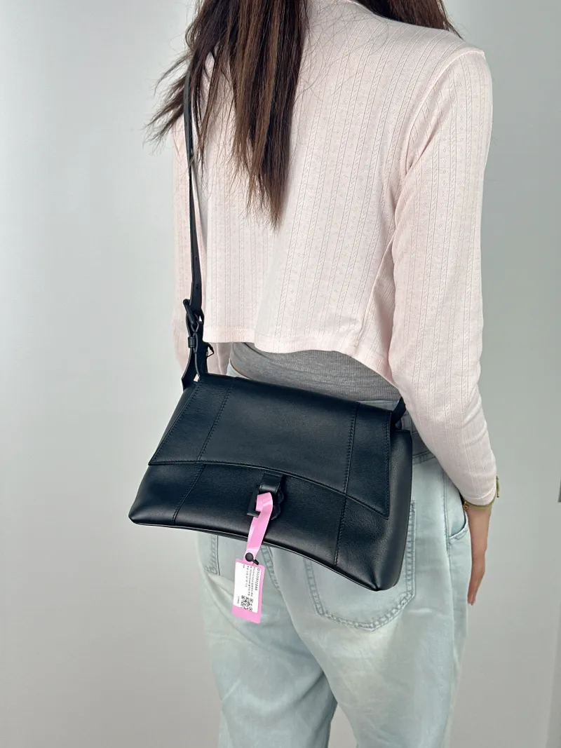 BALENCIAGA Shoulder Bag DOWNTOWN Black Calfskin Small 30 × 10 × 17.5 cm — on-model view 1 of 2