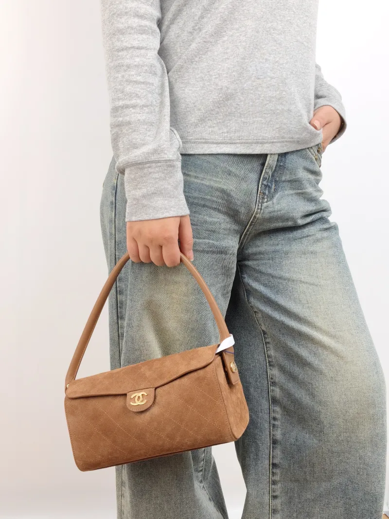 Chanel Shoulder Bag Baguette Bag Brown Suede One Size 23 × 11 × 11 cm — on-model view 1 of 3