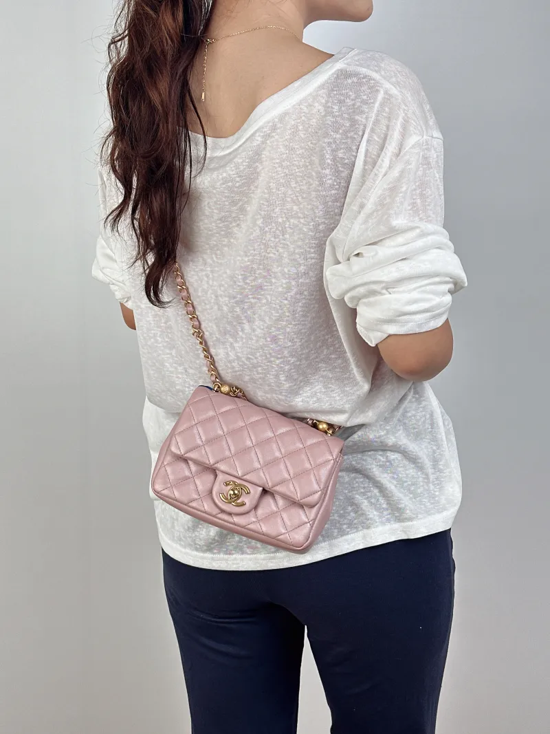 Chanel Crossbody Bag24p Pearl Pink Lambskinmini17 × 5 × 13 cm — on-model view 3 of 3