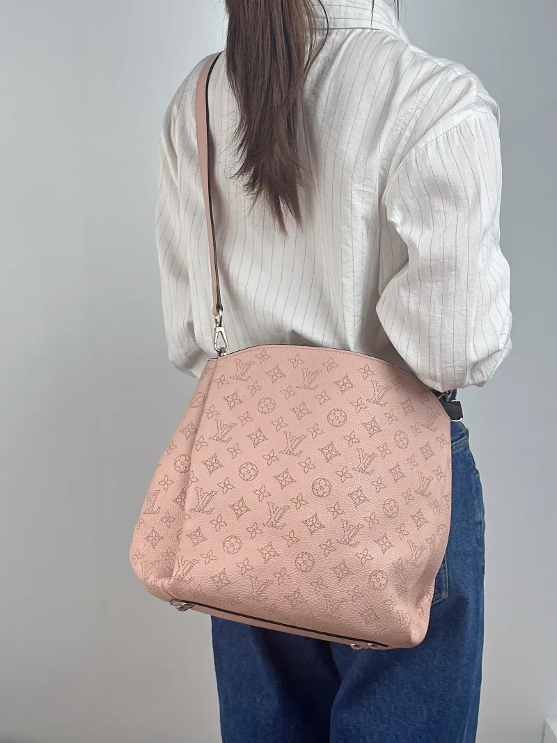 Louis Vuitton Crossbody Bag Babylone Calfskin Large 37 × 18 × 31 cm — on-model view 3 of 3