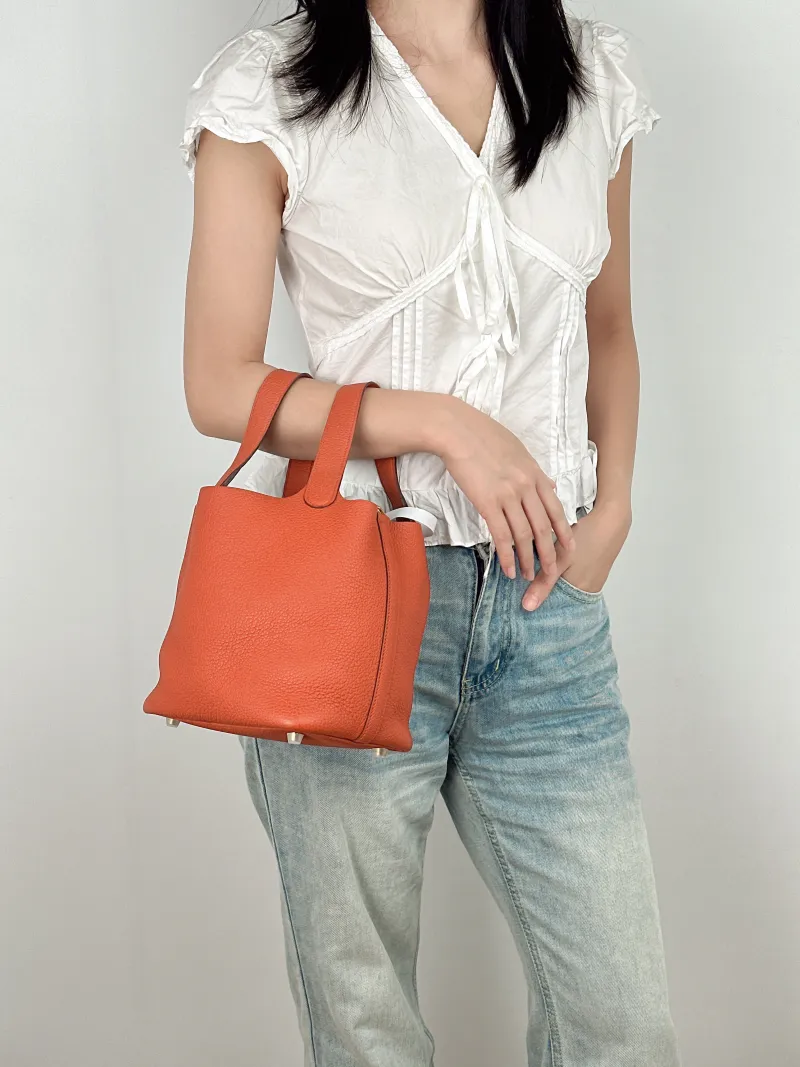 Hermès Top Handle Bag Picotin Lock 18 1836 Red TC Calfskin Small18 × 13 × 18 cm — on-model view 2 of 2