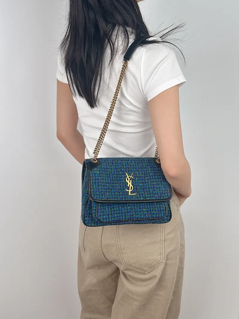SAINT LAURENT Crossbody Bag Niki D Small 21 × 7.5 × 16 cm — on-model view 1 of 2
