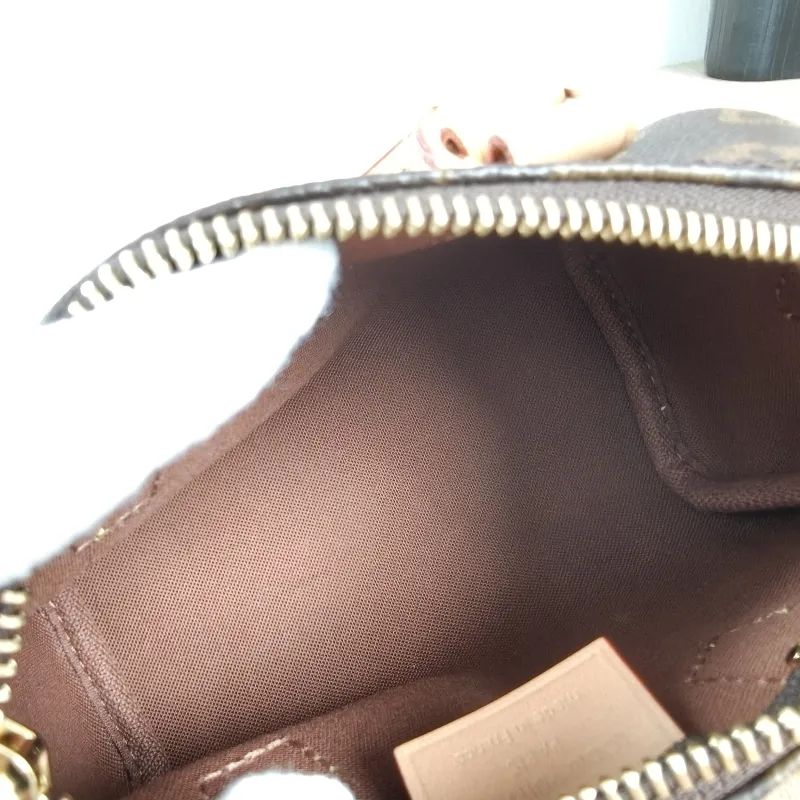 Louis Vuitton Crossbody Bag Speedy Nano Shoulder Strap PVC nano 16 × 7.5 × 10 cm — detail view 5 of 11