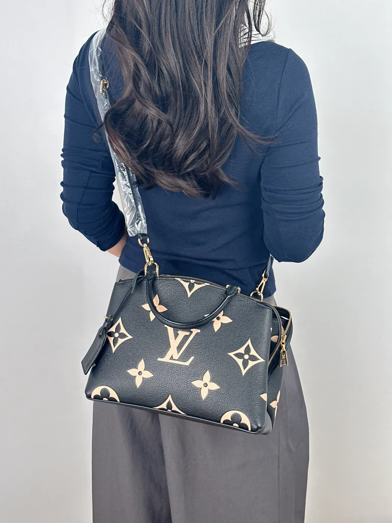 Louis Vuitton Crossbody Bag PETIT PALAIS Tote Bag Monogram Empreinte Embossed Calfskin Small 29 × 12.5 × 18 cm — on-model view 2 of 2