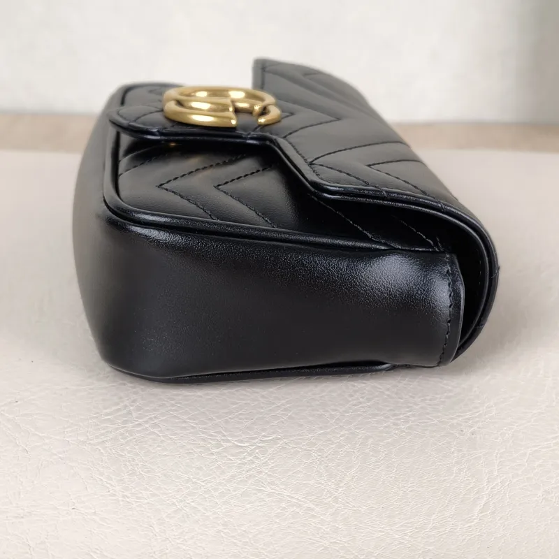 GUCCI Crossbody Bag GG Marmont Mini Marmont Mini Black with Gold-Tone Hardware Calfskinmini16.5 × 4.5 × 9.5 cm — detail view 3 of 13