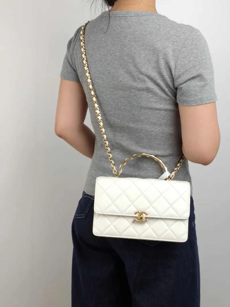 Chanel Crossbody Bag White Gold Calfskin One Size 23 × 5 × 15 cm — on-model view 3 of 3
