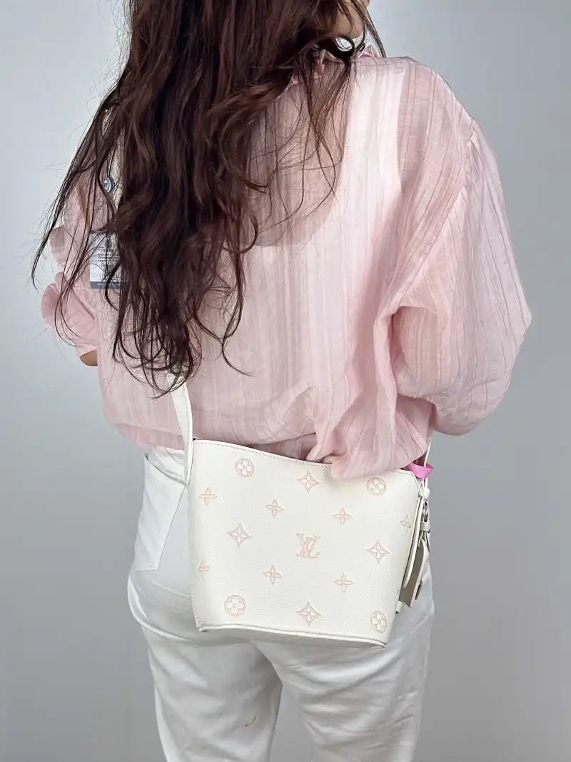 Louis Vuitton Top Handle Bag ALL IN BB White · Pink Calfskin BB 16 × 12 × 18 cm — on-model view 2 of 2