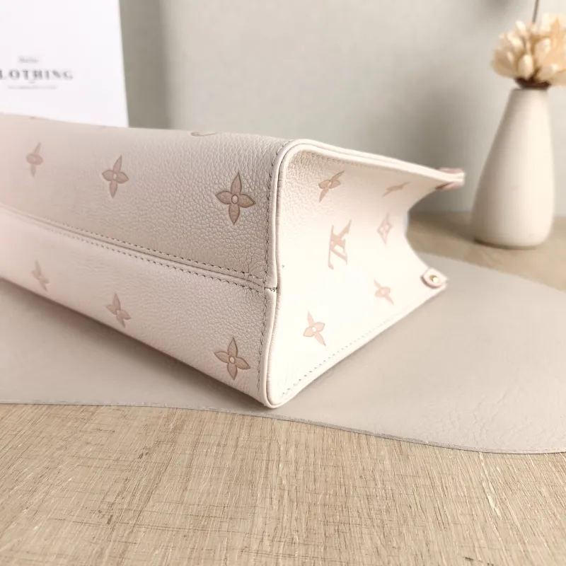 Louis Vuitton Shoulder Bag Onthego Beige · Pink Empreinte Embossed Calfskin Small 25 × 11.5 × 19 cm — detail view 12 of 12