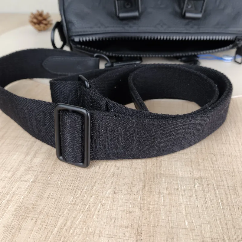 Louis Vuitton Crossbody Bag Keepall 25 Taurillon Embossed Calfskin Monogram Medium25 × 11 × 15 cm — detail view 10 of 12