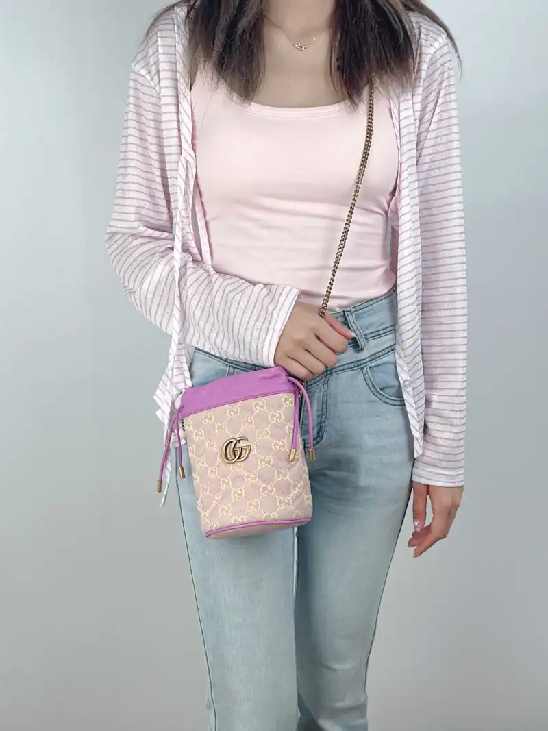 GUCCI Crossbody Bag GG Marmont Marmont Bucket Bag Canvas Calfskin mini14 × 13 × 17 cm — on-model view 2 of 2