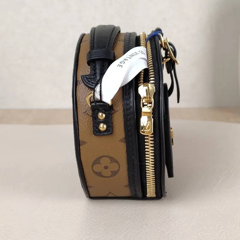 Louis Vuitton Crossbody Bag Mini BOITE CHAPEAU Monogram PVC Mini 13 × 6.5 × 12 cm — detail view 1 of 10
