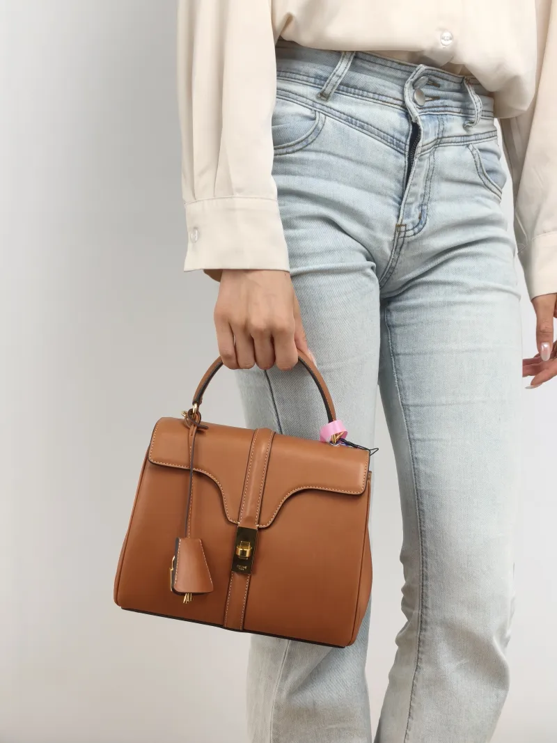 CELINE Crossbody Bag 16 Edition Caramel Calfskin Small 23 × 10 × 18 cm — on-model view 1 of 2