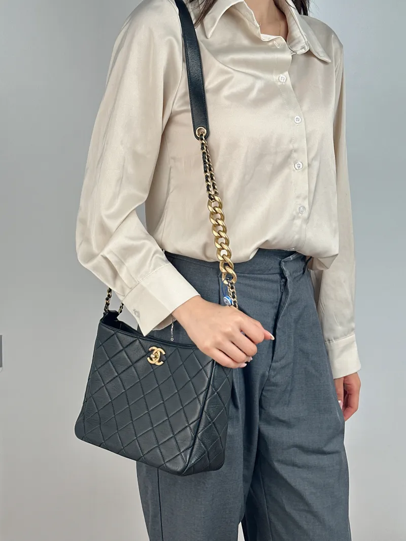Chanel Shoulder Bag hobo Black with Gold-Tone Hardware Lambskin One Size 22 × 9 × 19 cm — on-model view 2 of 2