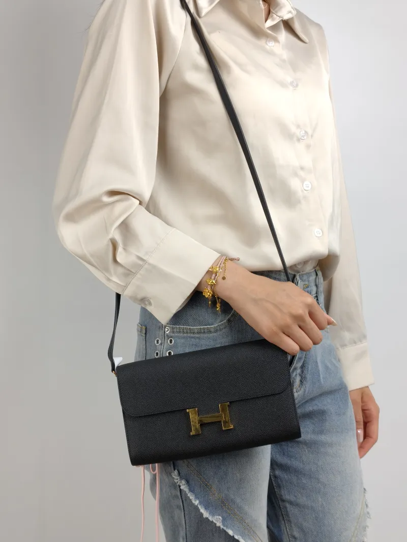 Hermès Crossbody Bag Constance To Go woc Gold-Tone Hardware Black Epsom Embossed Calfskin One Size 21 × 2 × 13 cm W — on-model view 2 of 2