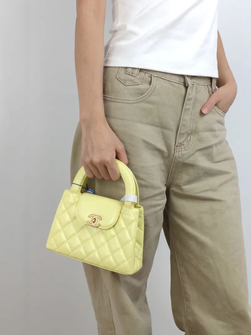 Chanel Crossbody Bag Kelly Yellow Waxed Leather Mini 19 × 7 × 13 cm — on-model view 2 of 3