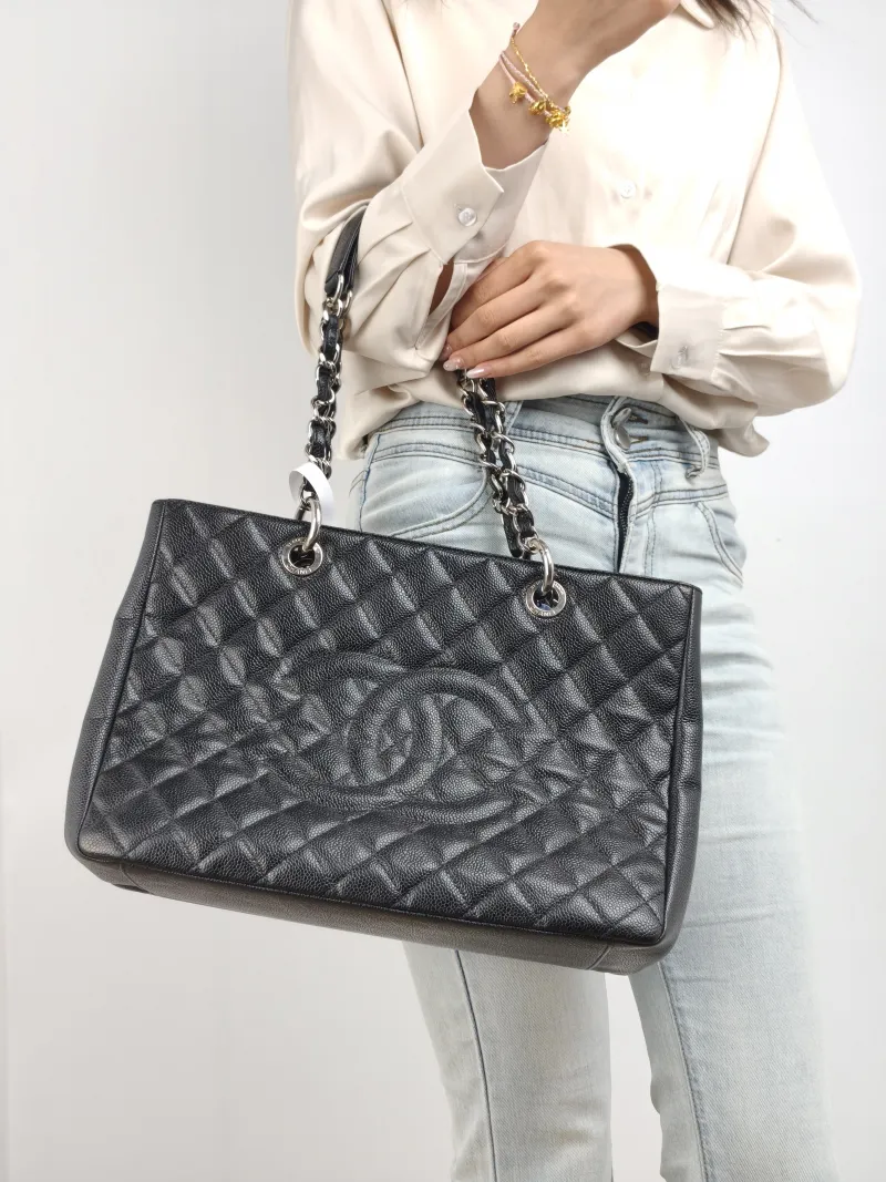 Chanel Shoulder Bag Grand Shopping Tote​ GST Shopping Tote Black Grained Calfskin Large 33 × 13 × 24 cm 15 — on-model view 1 of 2