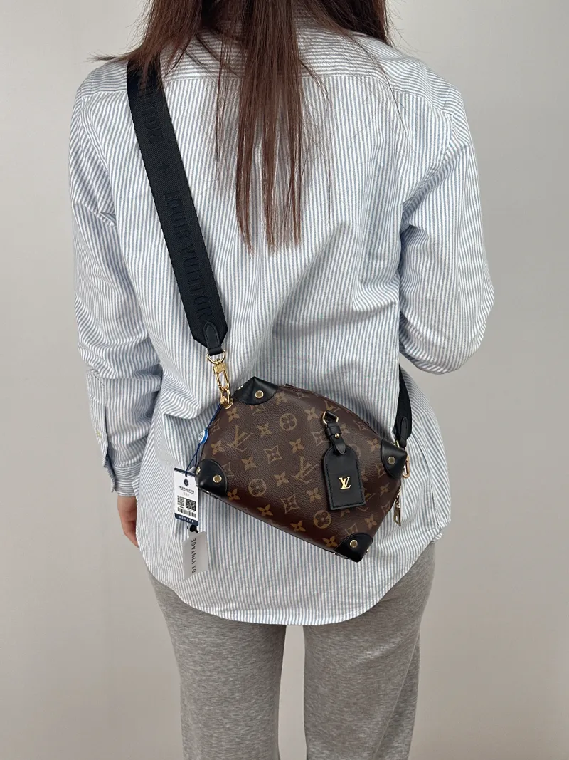 Louis Vuitton Crossbody Bag Petite Malle Souple Box Black PVC One Size20 × 7.5 × 14 cm — on-model view 1 of 2