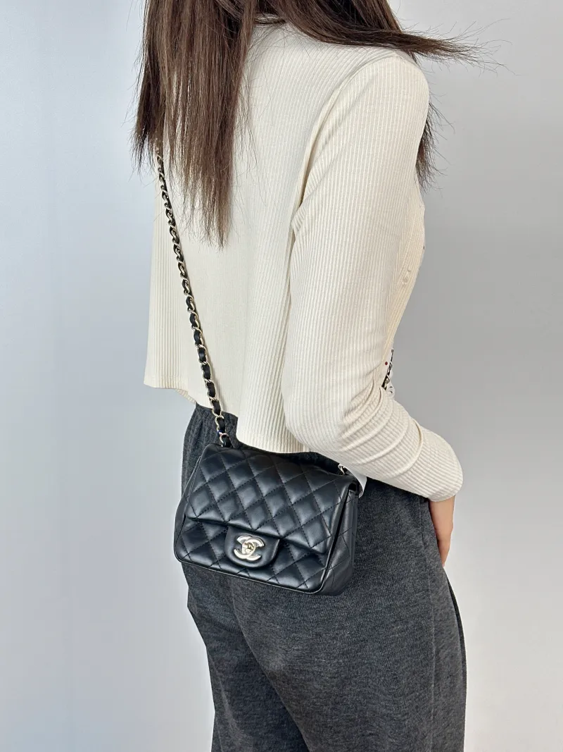 Chanel Crossbody Bag Classic Flap Mini CF Mini Black Lambskin One Size17 × 8 × 13.5 cm — on-model view 1 of 2