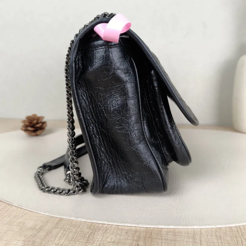 SAINT LAURENT Crossbody Bag Niki Black Waxed Leather Calfskin Small 21 × 7.5 × 16 cm — detail view 1 of 13