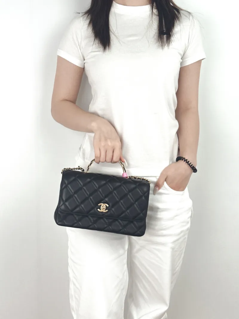 Chanel Crossbody Bag Black Lambskin One Size25 × 9 × 14.5 cm — on-model view 3 of 3
