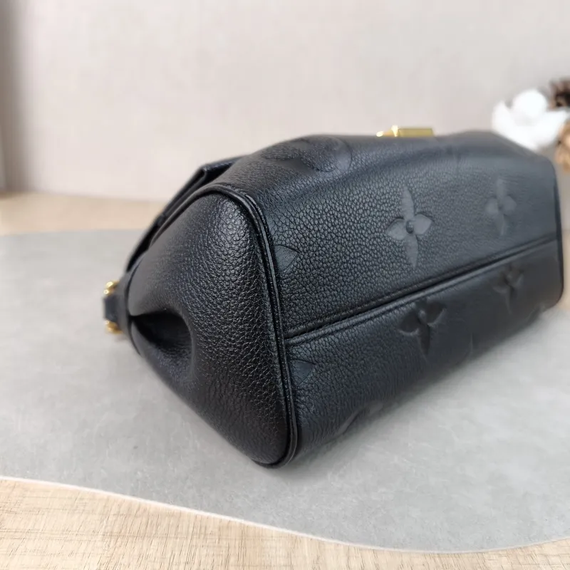 Louis Vuitton Crossbody Bag Favorite Black Monogram Empreinte Embossed Calfskin Medium 24 × 9 × 14 cm — detail view 3 of 12