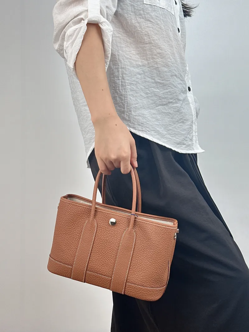 Hermès Top Handle Bag Neo Garden 23 Mini Negonda Calfskin Mini 23 × 10 × 16 cm K — on-model view 2 of 2