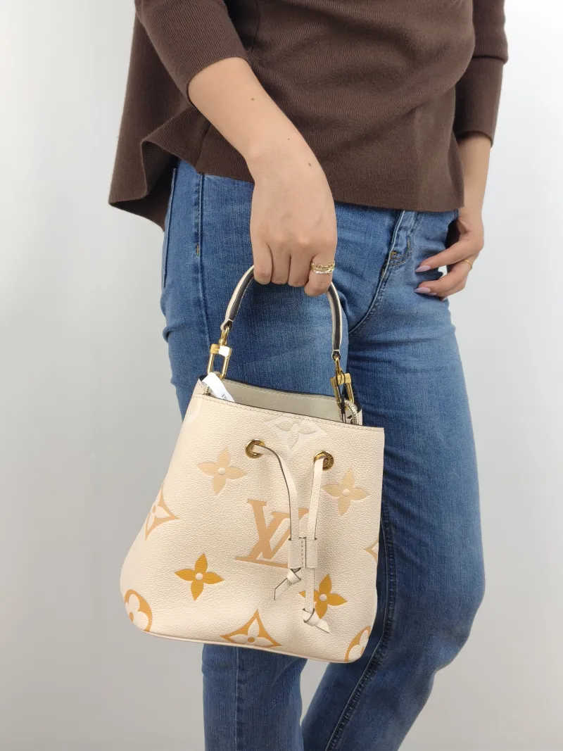 Louis Vuitton Crossbody Bag NÉONOÉ Bucket Bag BB Monogram Empreinte Embossed Calfskin BB 20 × 13 × 20 cm — on-model view 2 of 2