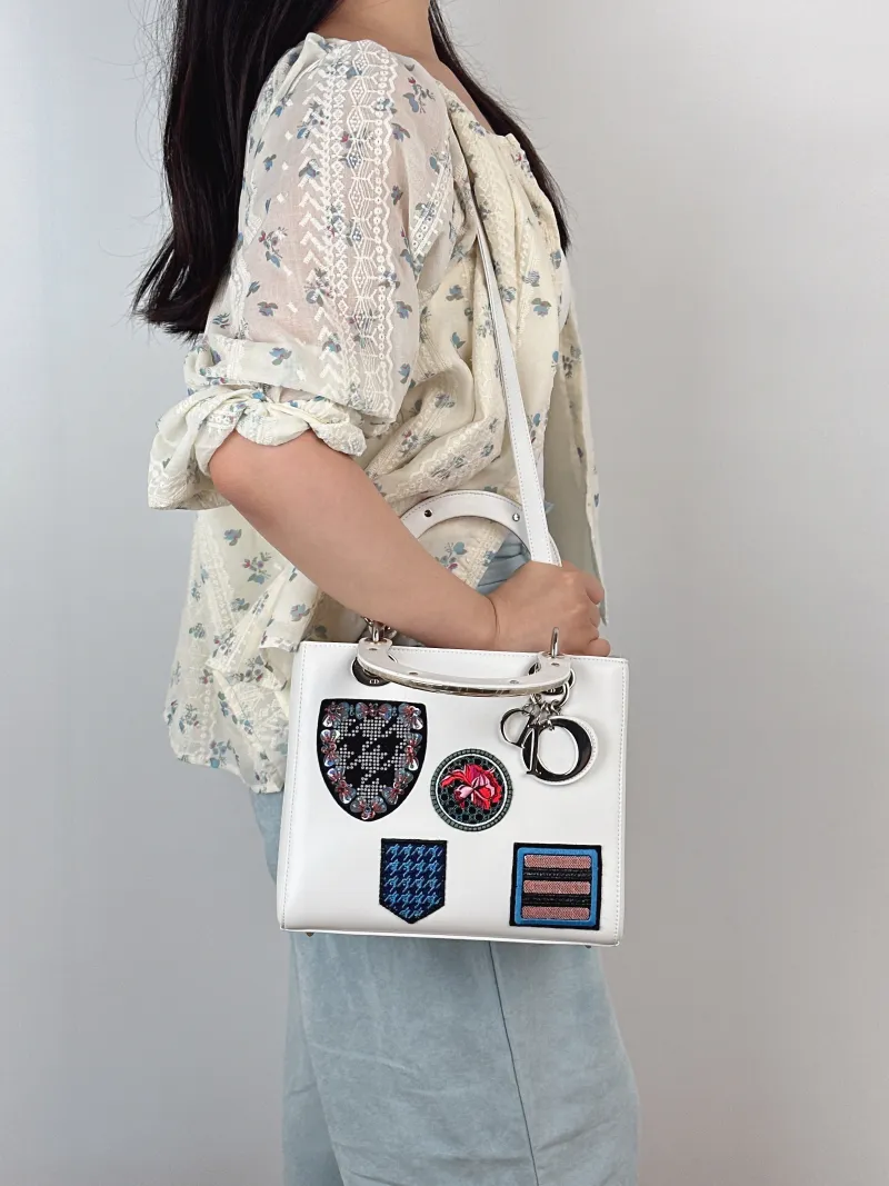 DIOR Top Handle Bag Lady Lady Dior Bag White Calfskin Medium24 × 12 × 21 cm — on-model view 1 of 2