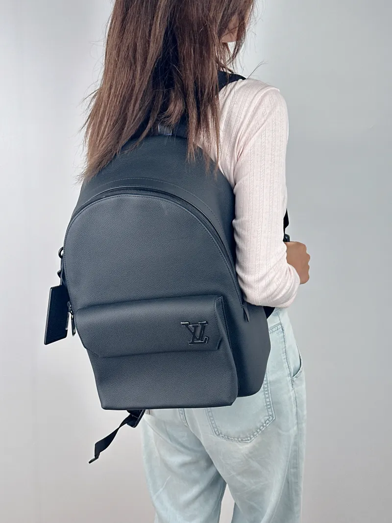 Louis Vuitton Backpack Takeoff Backpack Black Calfskin One Size 30 × 14 × 43 cm — on-model view 1 of 2