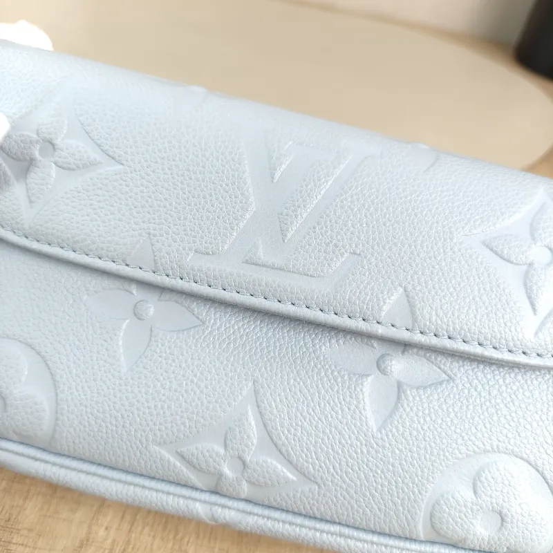 Louis Vuitton Crossbody Bag IVY Blue Empreinte Embossed Calfskin Small 23.5 × 4.3 × 12 cm — detail view 7 of 13
