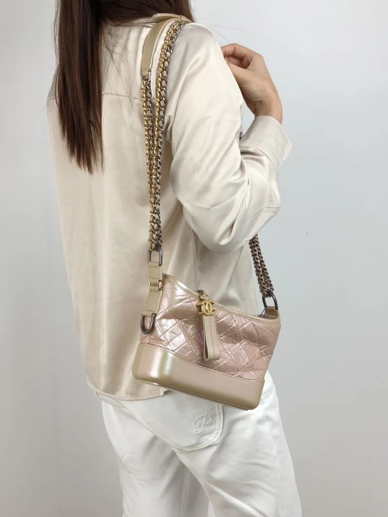 Chanel Crossbody Bag Gabrielle Gabrielle Bag Calfskin Small 20 × 8 × 15 cm 27 — on-model view 1 of 2