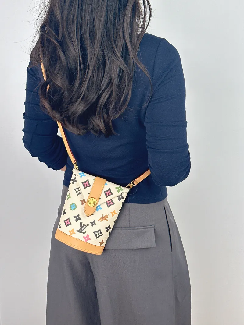 Louis Vuitton Crossbody Bag ENVELOPE POUCH Yellow PVC Mini 12.5 × 8.5 × 18 cm — on-model view 2 of 2