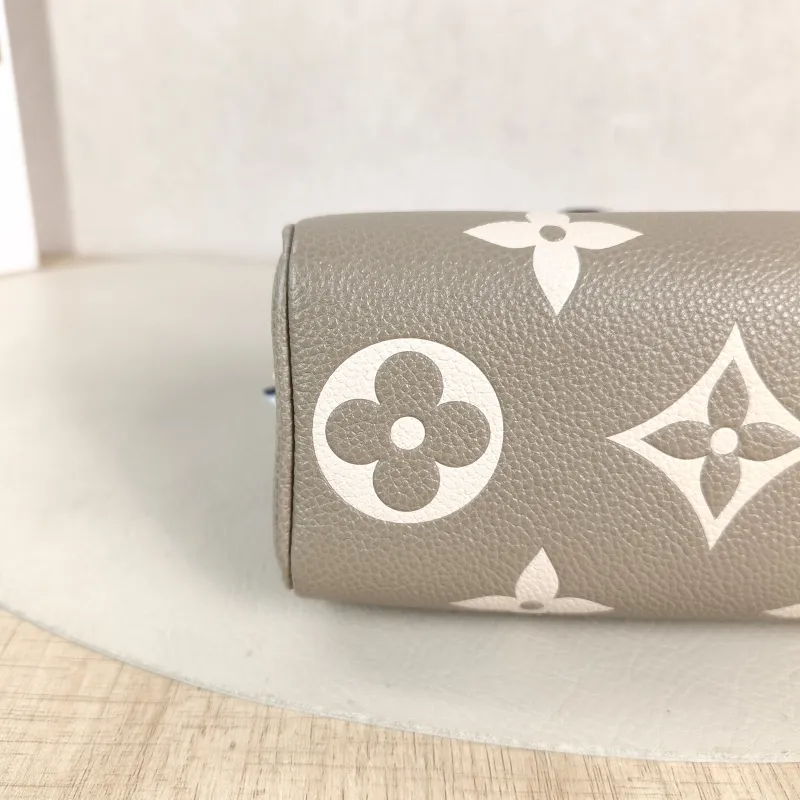Louis Vuitton Crossbody Bag Speedy Nano · White Monogram Empreinte Embossed Calfskin nano 16 × 7.5 × 10 cm — detail view 11 of 11