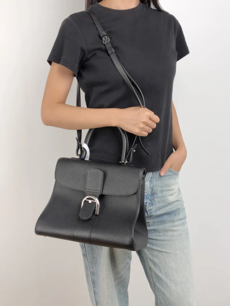 DELVAUX Top Handle Bag Brillant Black Calfskin Medium 29 × 15 × 22 cm — on-model view 3 of 3