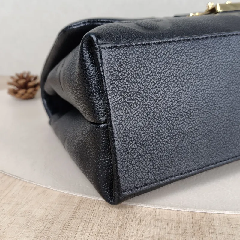 Louis Vuitton Crossbody Bag MADELEINE Black Monogram Empreinte Embossed Calfskin Medium 30 × 11 × 19.5 cm — detail view 7 of 13