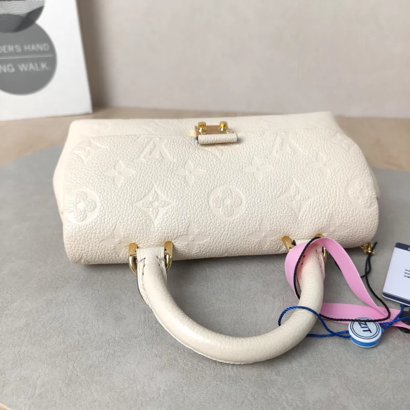 Louis Vuitton Crossbody Bag MADELEINE White Empreinte Embossed Calfskinnano21 × 6 × 12.5 cm — detail view 2 of 14